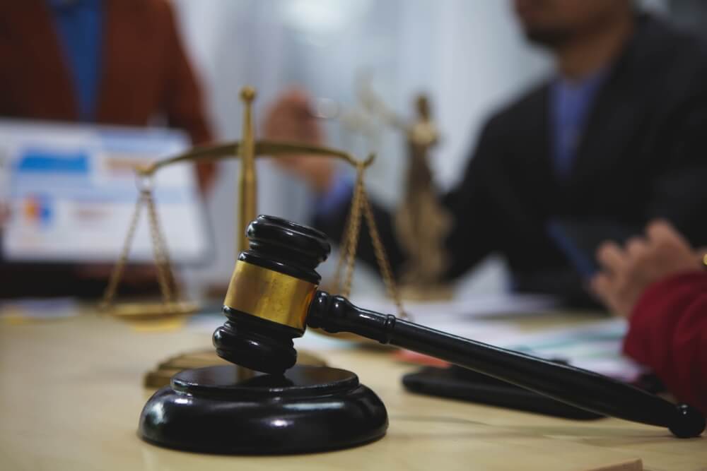 Gavel and justice scales on desk during personal injury lawyer consultation in BC