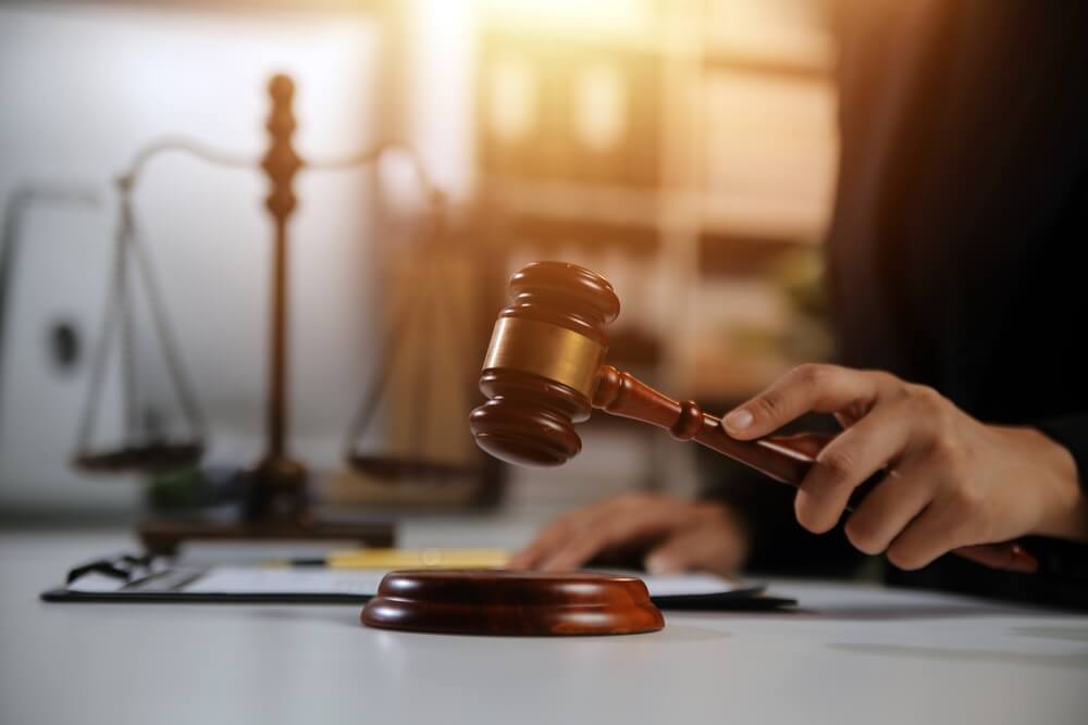 Judge’s gavel and scales of justice symbolizing BC Occupiers’ Liability Act case in Vancouver