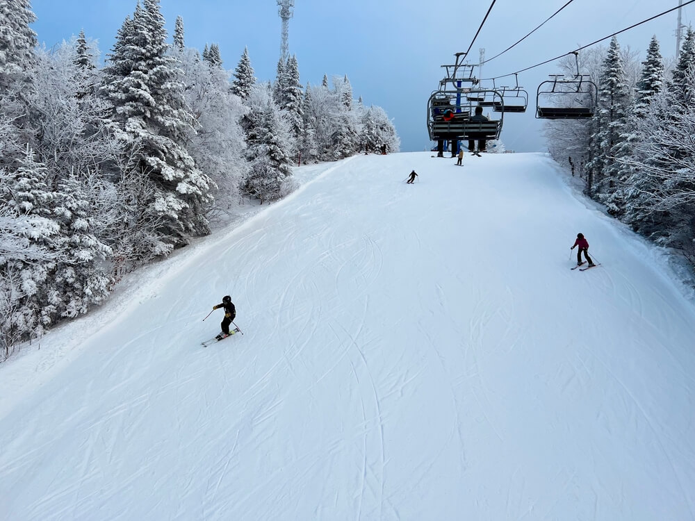 Skiers at a BC winter sports resort where waivers and assumption of risk may apply